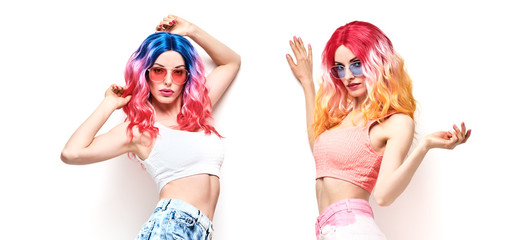 Fashion. Two beautiful hipster woman, stylish clothes, trendy pink hair. Cheerful shapely happy model girl, sisters friends on white. Creative fashionable lady, trendy pink hairstyle concept, banner