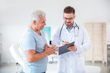 Mature man visiting urologist in clinic
