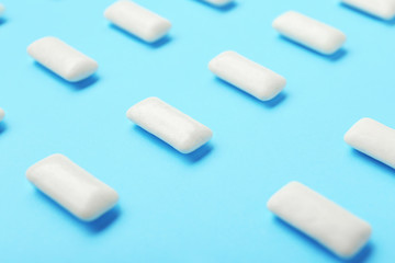 Chewing gums on color background