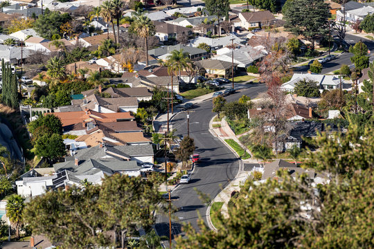 Hilltop view of houses and curvy suburban streets in the northeast San Fernando Valley area of  Los Angeles, California. 