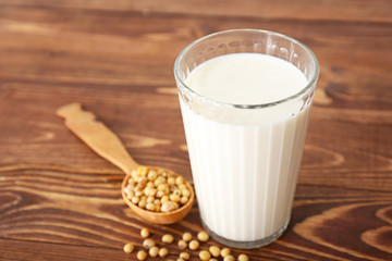 Glass of soy milk on table
