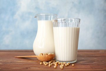 Tasty soy milk on table