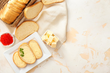 Plate with tasty bread, butter and red caviar on white background