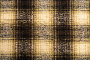 Close-up of background is checkered in brown and black in Scottish style.