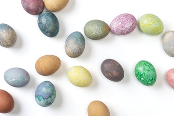 Different easter eggs on white background