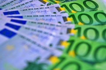 United country's payment system - euro money cash background, pile of paper euro banknotes.