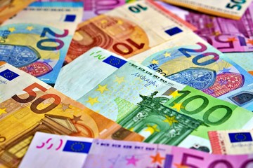 United country's payment system - euro money cash background, pile of paper euro banknotes.