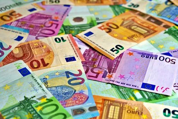 United country's payment system - euro money cash background, pile of paper euro banknotes.