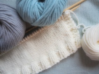 knitting and needles background with space for writing