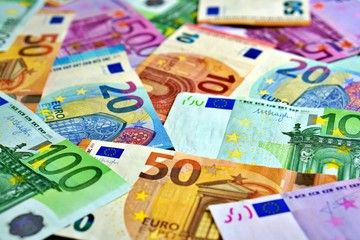 United country's payment system - euro money cash background, pile of paper euro banknotes.