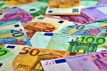 United country's payment system - euro money cash background, pile of paper euro banknotes.