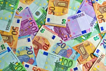 United country's payment system - euro money cash background, pile of paper euro banknotes.