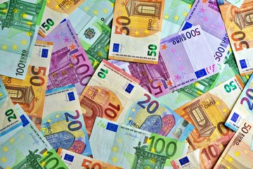 United country's payment system - euro money cash background, pile of paper euro banknotes.
