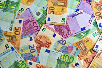 United country's payment system - euro money cash background, pile of paper euro banknotes.