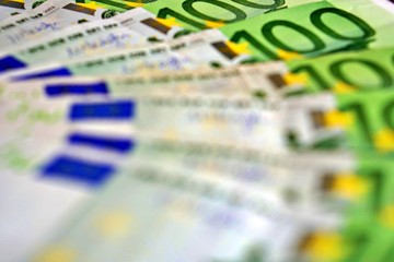 United country's payment system - euro money cash background, pile of paper euro banknotes.