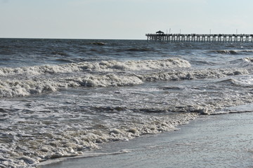 old breakwater in the sea