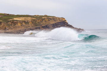 Ocean coast, moviment waves with foam.