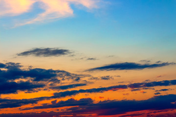 Fototapeta na wymiar orange sunset sky with clouds. beautiful nature background