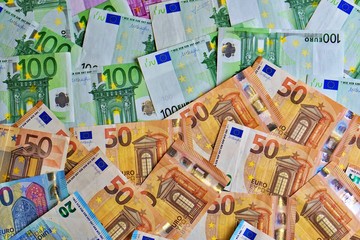 Fototapeta premium United country's payment system - euro money cash background, pile of paper euro banknotes. 