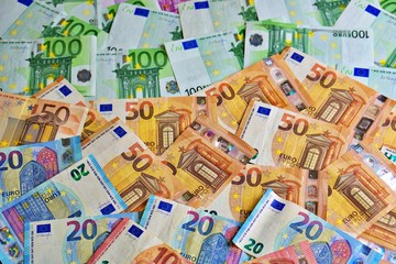 Naklejka premium United country's payment system - euro money cash background, pile of paper euro banknotes. 