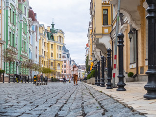 Beautiful Europe City street with colorful houses and a stone road