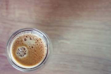 Coffee time in office. Capsule espresso in double glass cup - 100% arabica