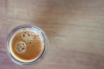 Coffee time in office. Capsule espresso in double glass cup - 100% arabica