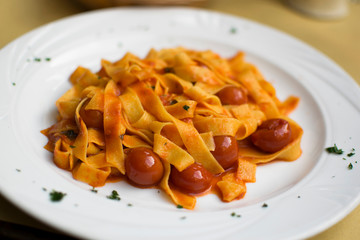 pasta with tomato sauce and basil