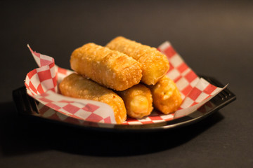 venezuelan tequeños chesse stick with ketchup