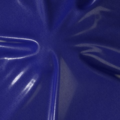 Abstract and shiny luxury silk cloth in shape of liquid wave with folds. Satin or velvet material background in popular Phantom Blue color. 3d illustration