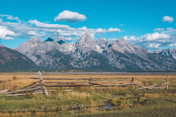 Grand Teton with nearby jagged peaks.