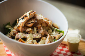 fresh chicken salad on white bowl