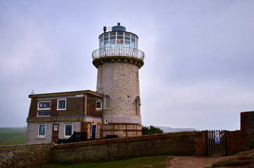 Fototapeta na wymiar Lighthouse At The Seven Sisters Cliffs