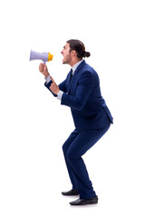 Fototapeta premium Young businessman with loudspeaker isolated on white