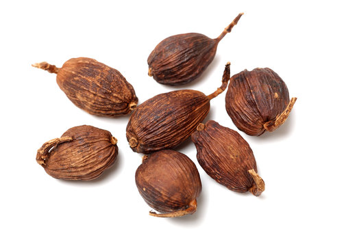 Black cardamom on a white background 