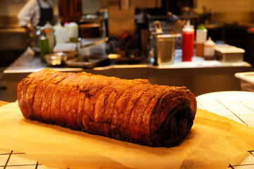 Huge grilled pork in an Italian restaurant