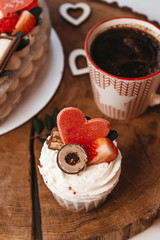 Cake heart with strawberries and coffee for valentines day.