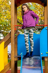 Little girl playing in park