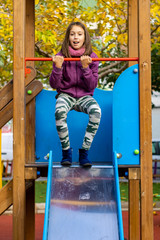 Little girl playing in park