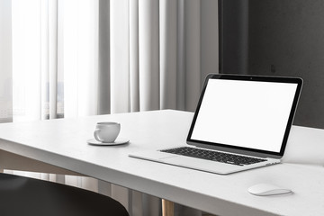 Blank laptop screen in freelance