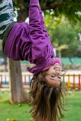 Little girl playing in park