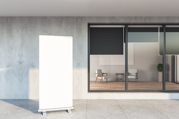 Apartament house with gray facade and blank billboard