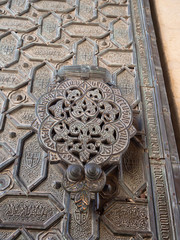 Old gates, doors, handles and locks in the old cities of Spain