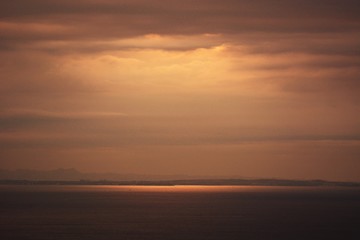 Fototapeta na wymiar Background material of natural scene / Sunrise shine reflected on the sea surface.