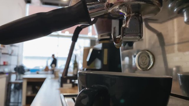 Barista working. The process of making coffee. Pouring coffee stream from professional machine in cup. Concept of energy. Coffee 4k stock footages