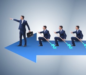 Team of businessmen in teamwork concept with boat