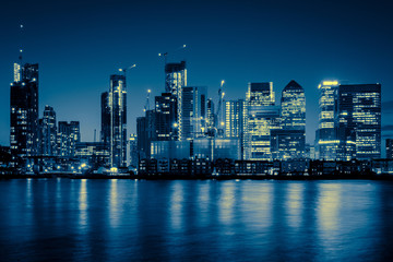 Fototapeta na wymiar Night Time Skyline View of Modern Business District Canary Wharf in London