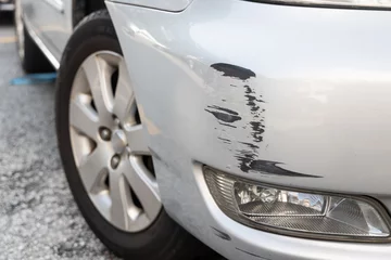 Deurstickers Scratch on car bumper due to minor accident © ThamKC