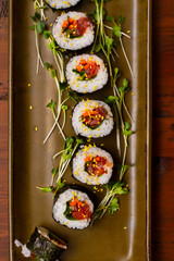 Rectangle Platter decorated with a row of sliced Sushi Roll