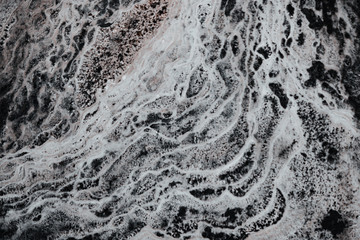 Naklejka premium abstract background with dry round reeble stones